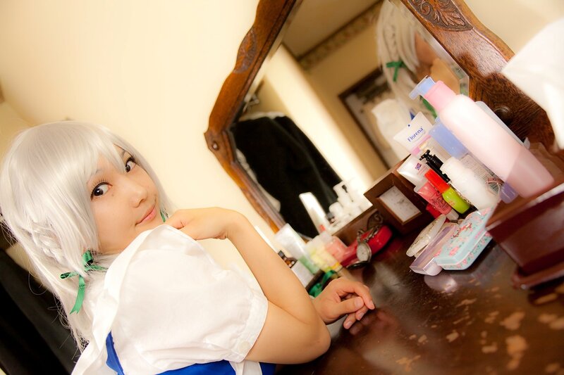 cosplayer at vanity mirror