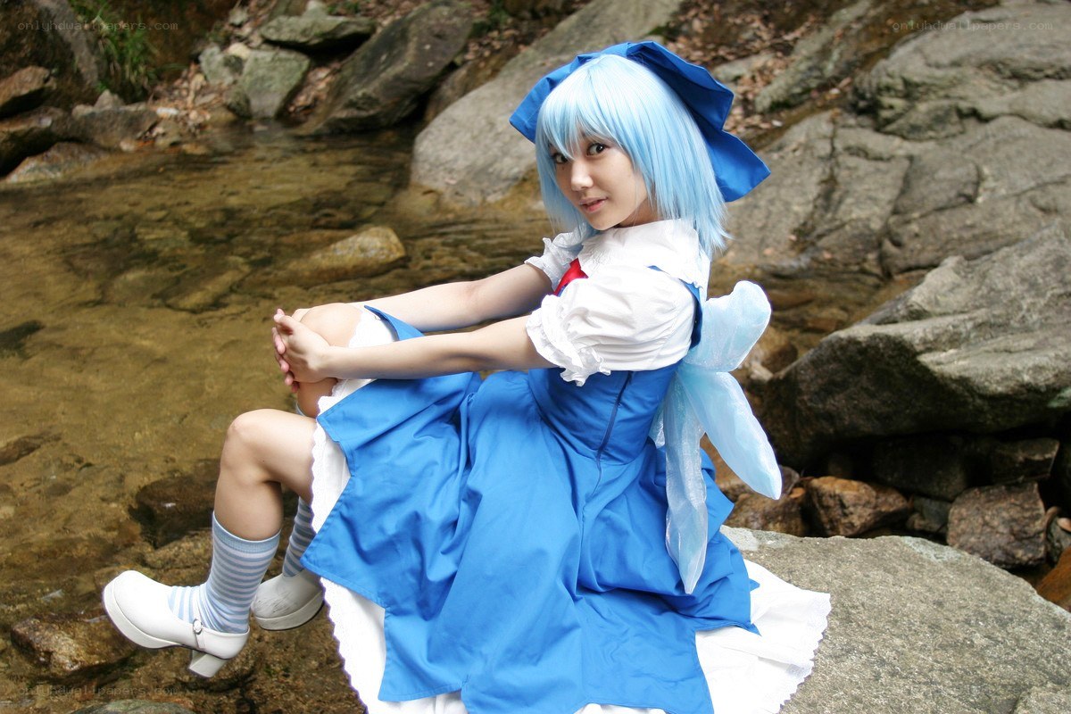 cosplayer by a stream