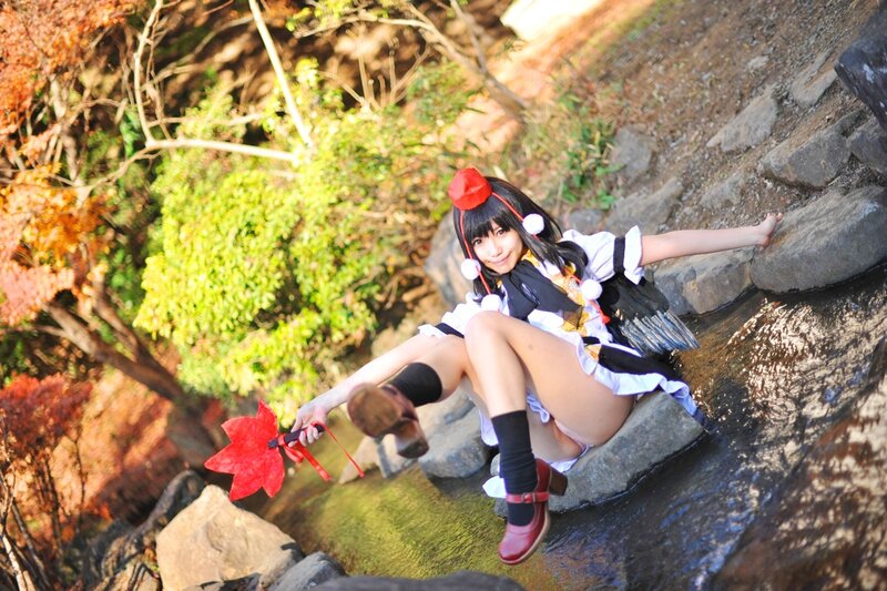 cosplayer by a stream