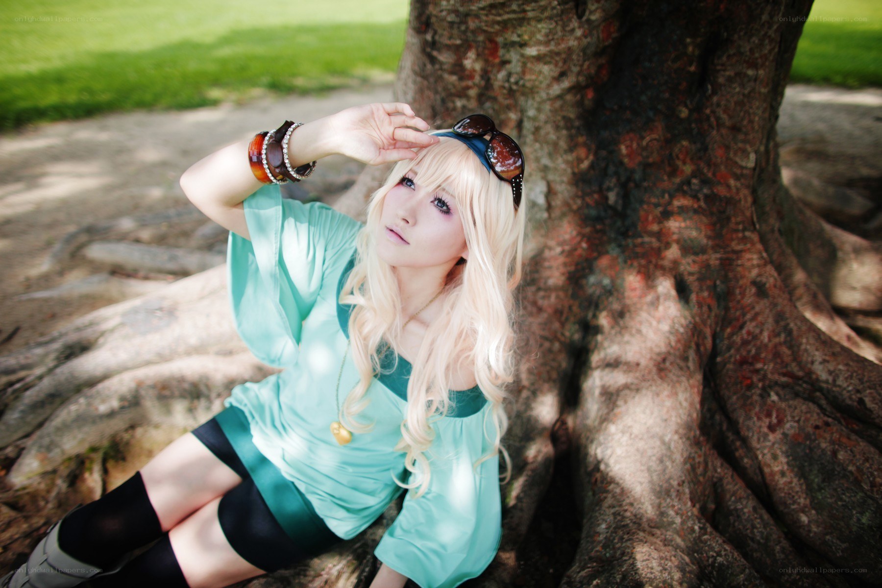 cosplayer by a tree