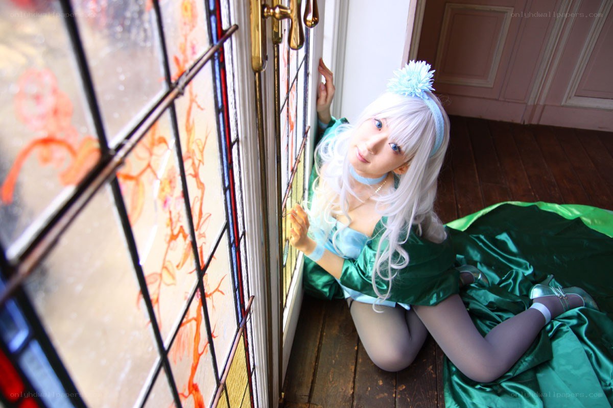 cosplayer by stained glass window