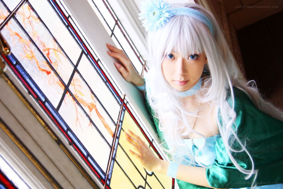 cosplayer by stained glass window