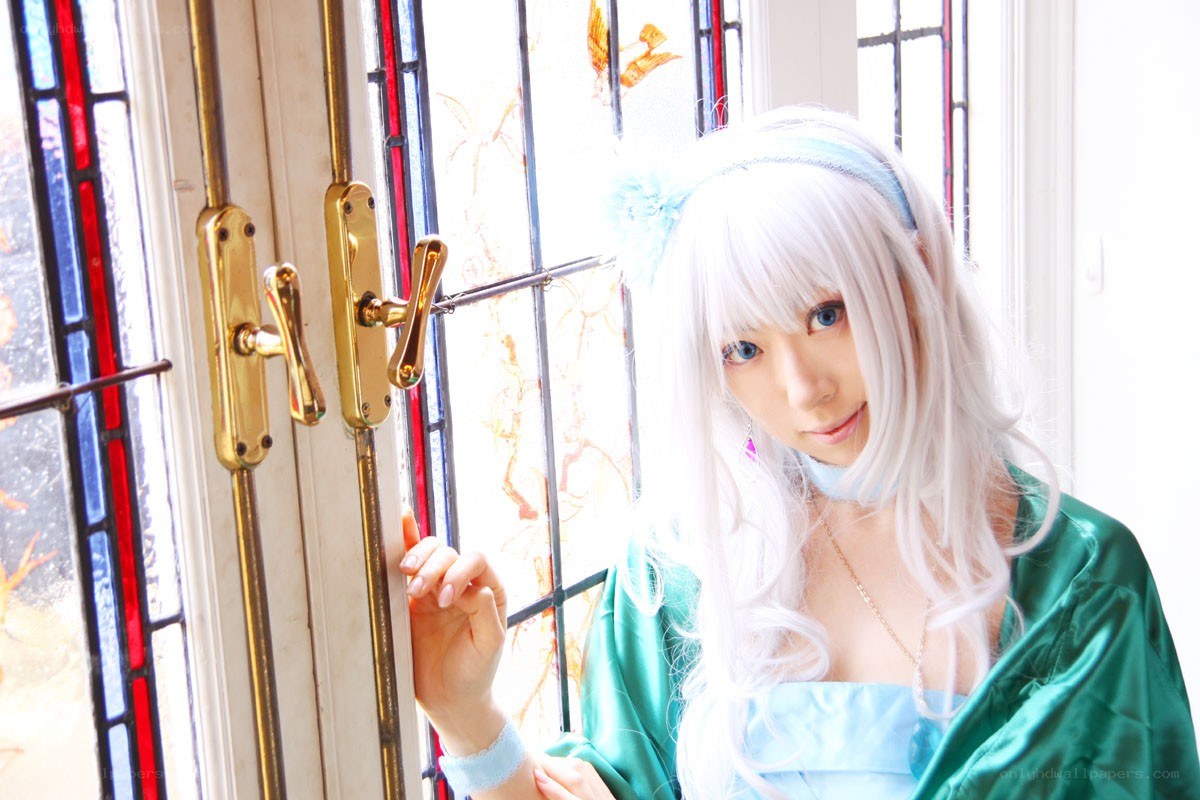 cosplayer by stained glass window