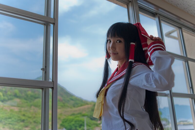 cosplayer by the window