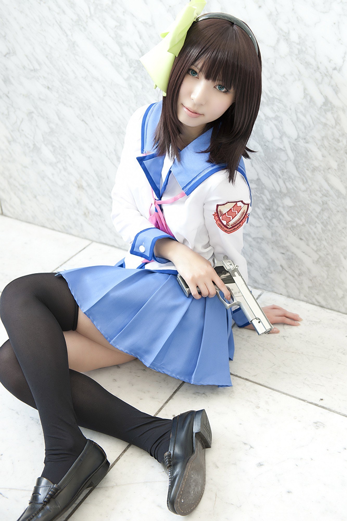 cosplayer holding a gun