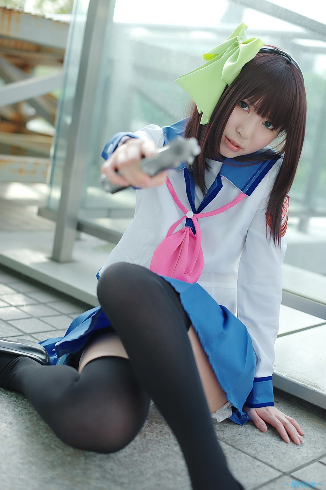 cosplayer holding a gun