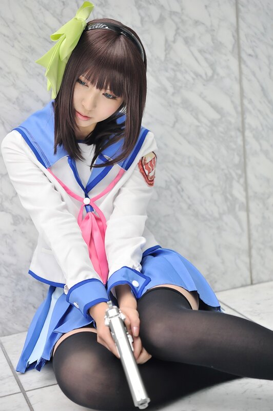 cosplayer holding a gun
