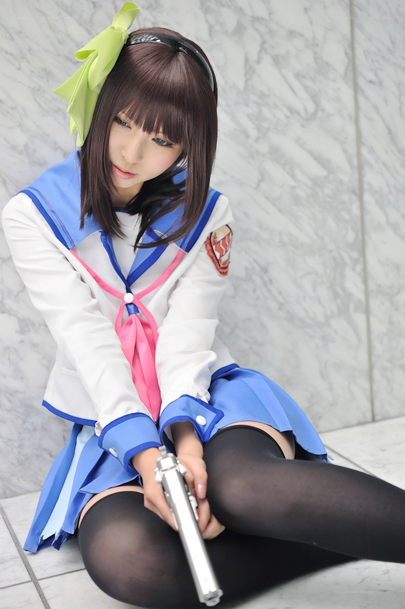 cosplayer holding a gun