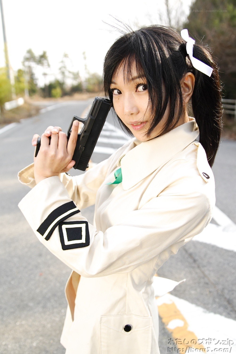 cosplayer holding a gun