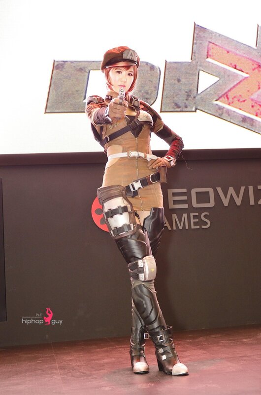 Cosplayer Holding a Gun — Brown, Dramatic