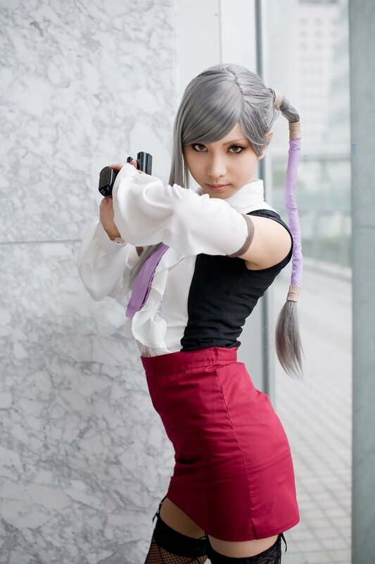cosplayer holding a gun