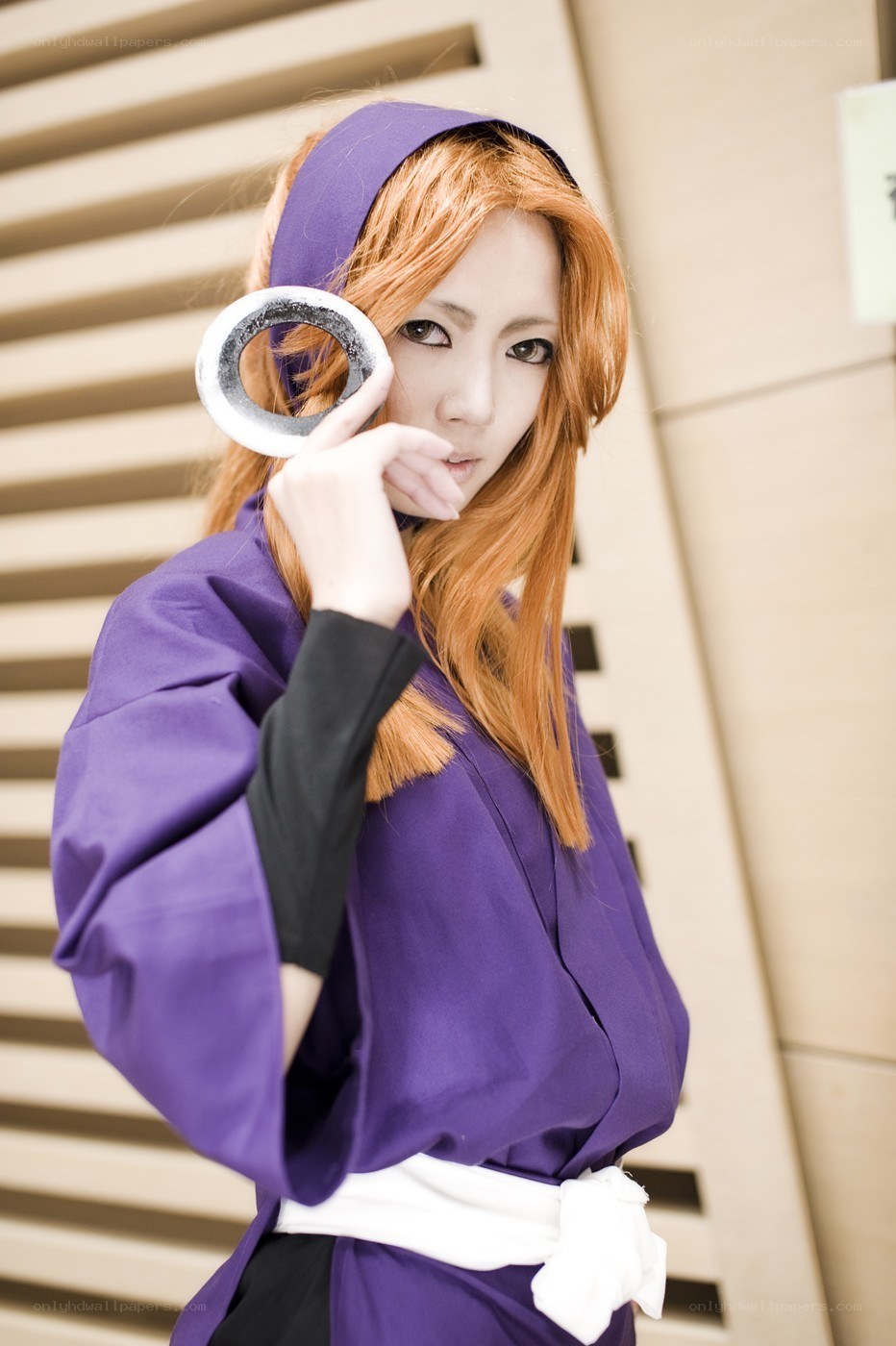 cosplayer holding a ring
