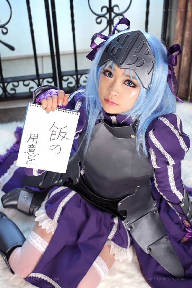 cosplayer holding a sign