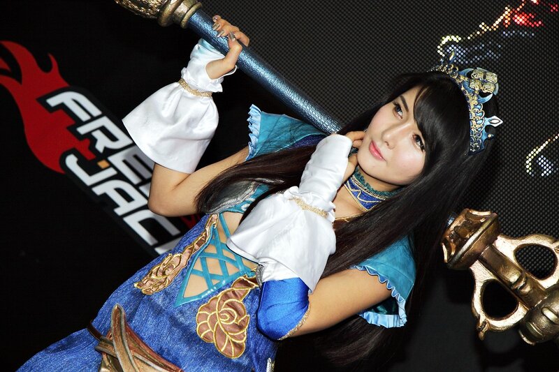 cosplayer holding a staff