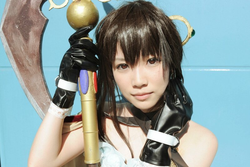 cosplayer holding a staff
