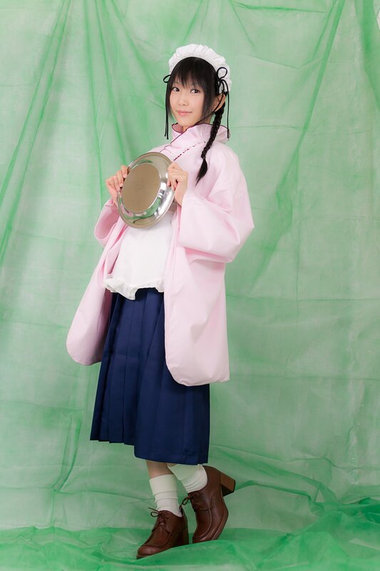 cosplayer holding a tray