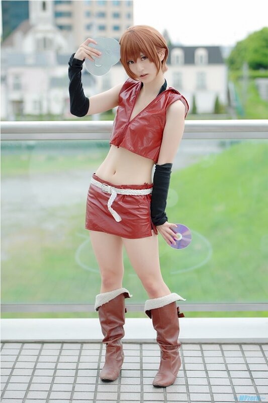 cosplayer holding CDs