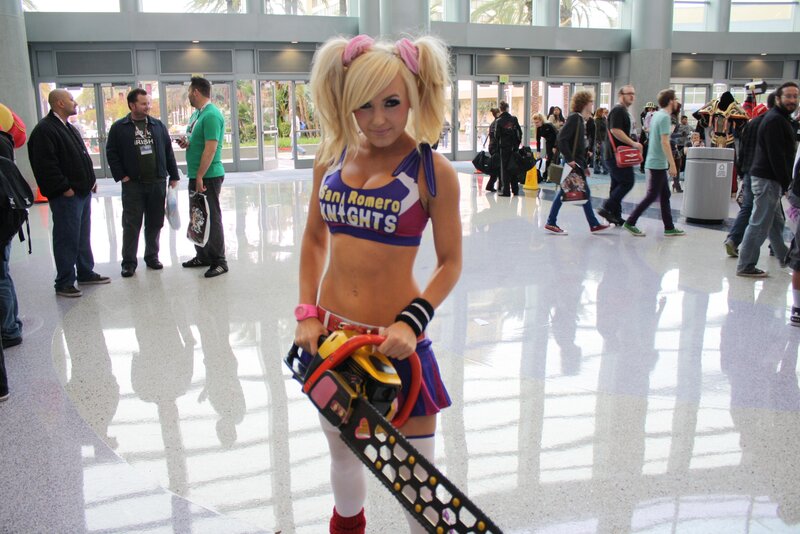 Cosplayer Holding Chainsaw — Purple
