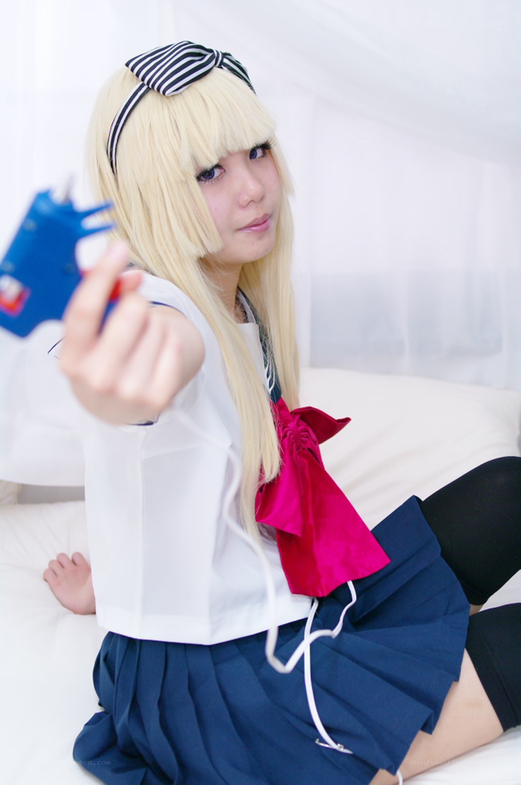 cosplayer holding glue gun