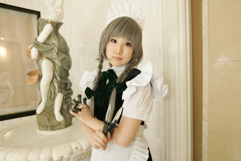 cosplayer holding knives