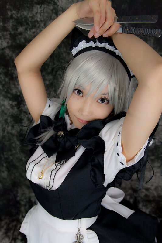 cosplayer holding knives