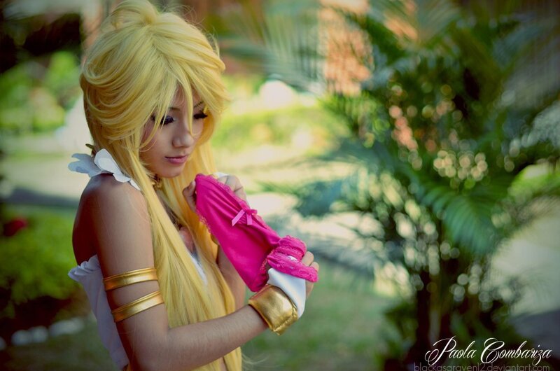 cosplayer holding pink glove