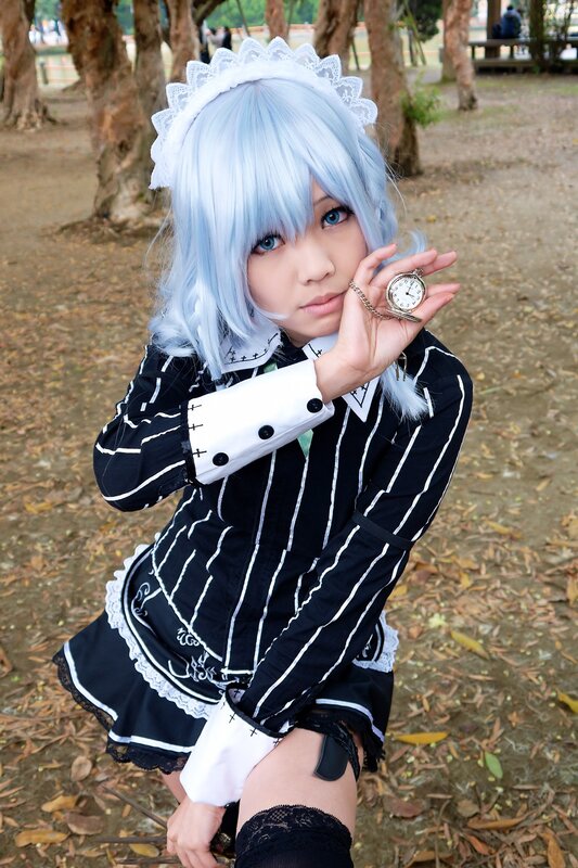 Cosplayer Holding Pocket Watch — Blue