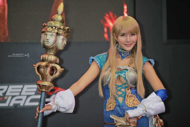 Cosplayer Holding Staff — Blue