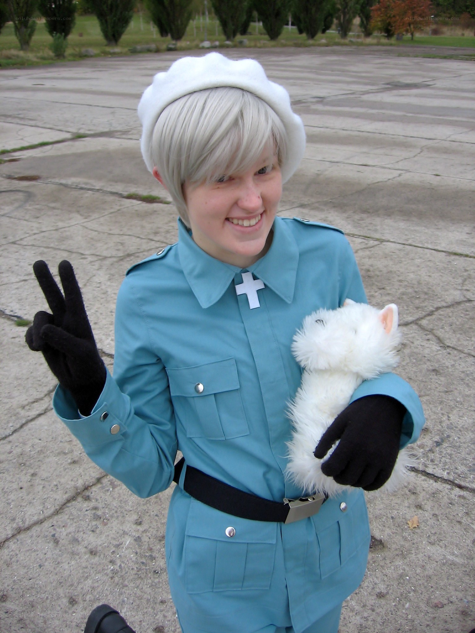 cosplayer holding stuffed animal