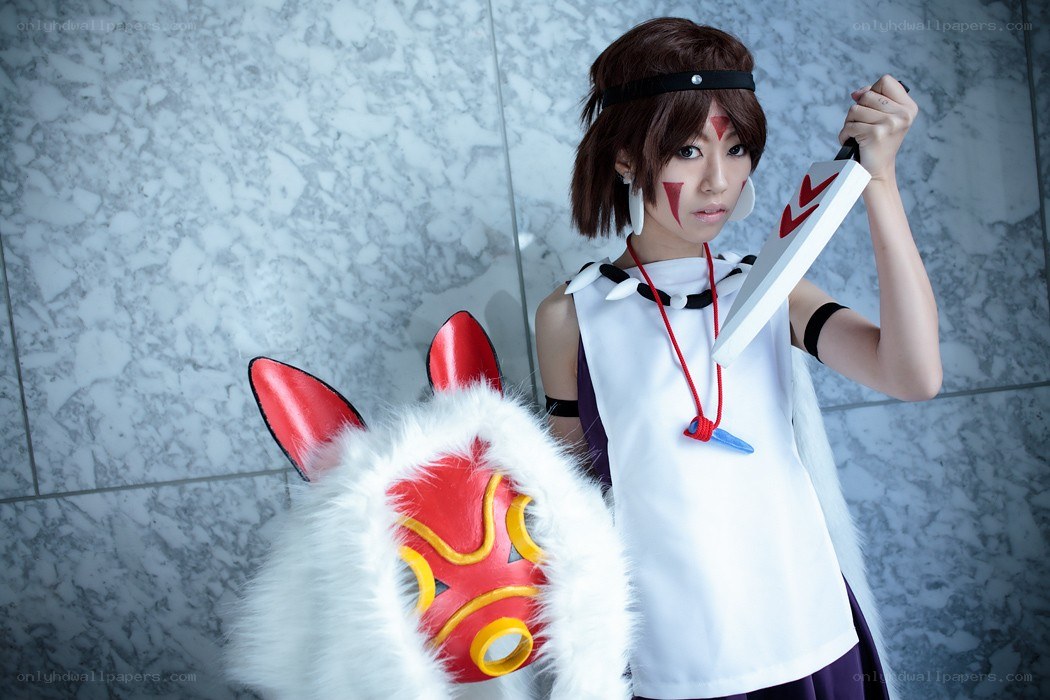 cosplayer holding sword and mask