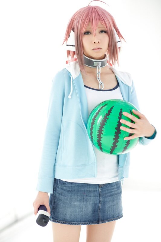 cosplayer holding watermelon ball