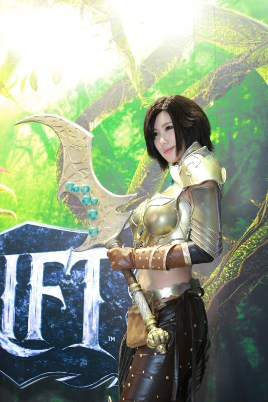 Cosplayer Holding Weapon — Green, Dramatic