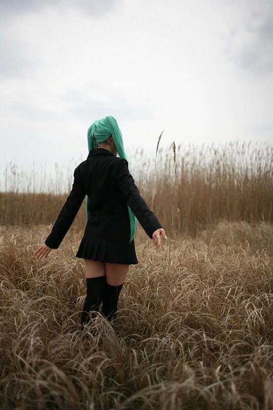 cosplayer in a field