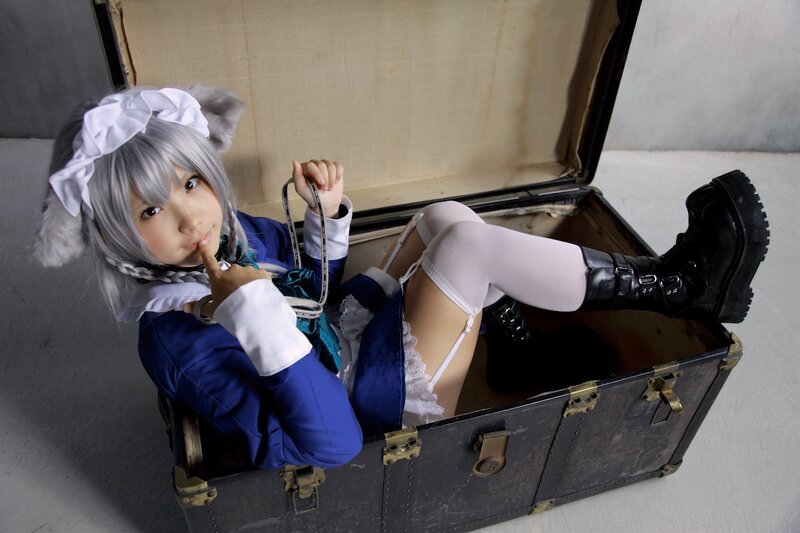 cosplayer in a suitcase