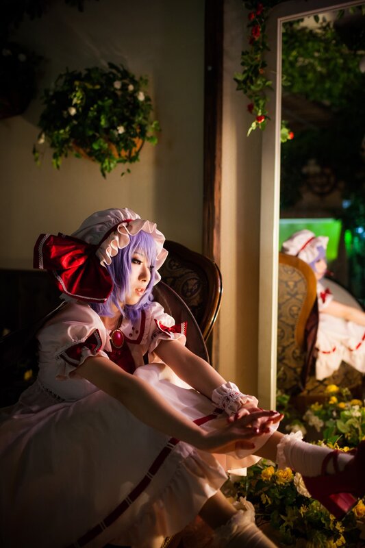 cosplayer in a white dress