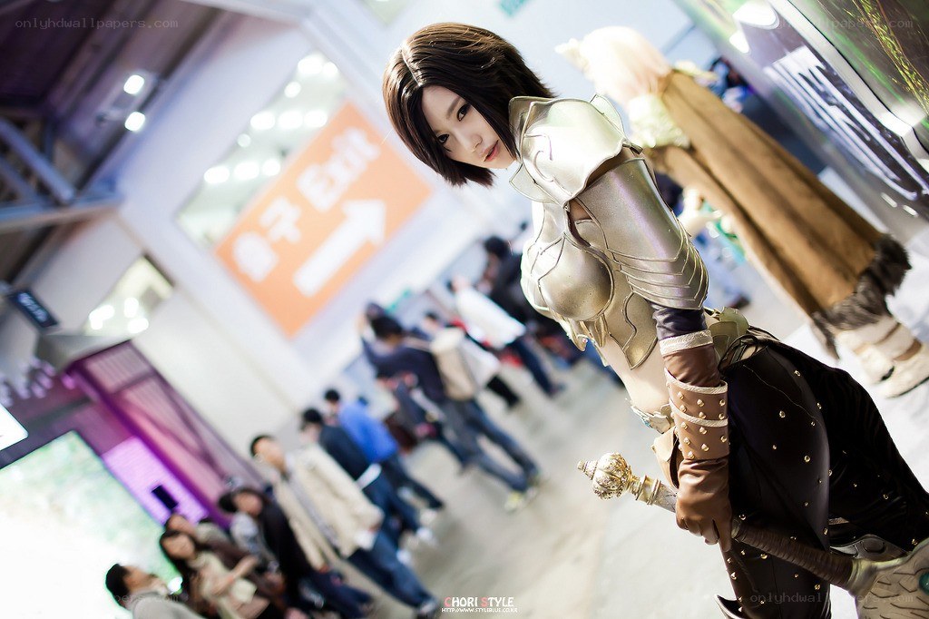 cosplayer in armor at convention