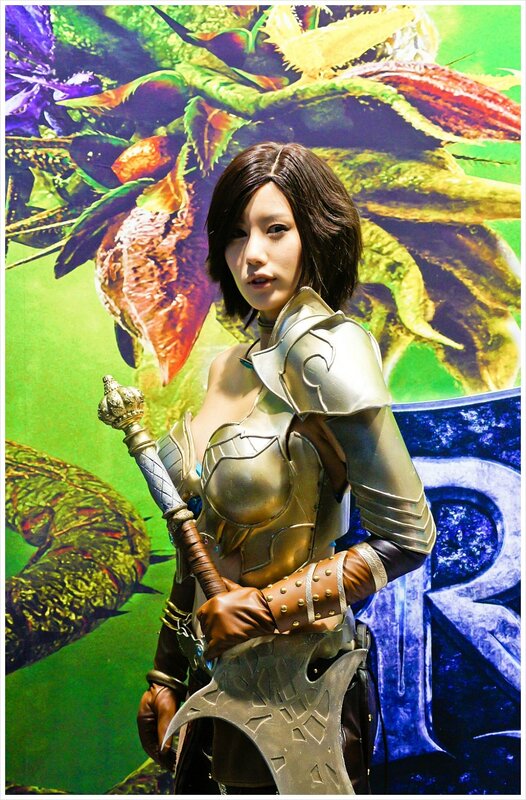cosplayer in armor with axe