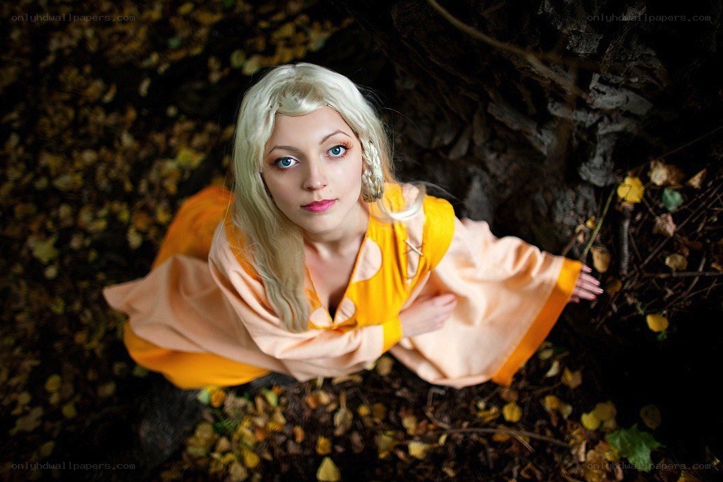 cosplayer in autumn forest
