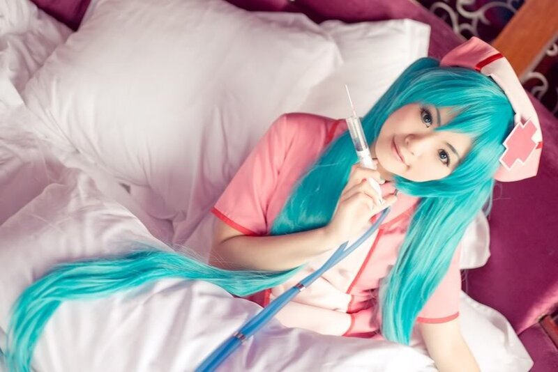 Cosplayer in Bed