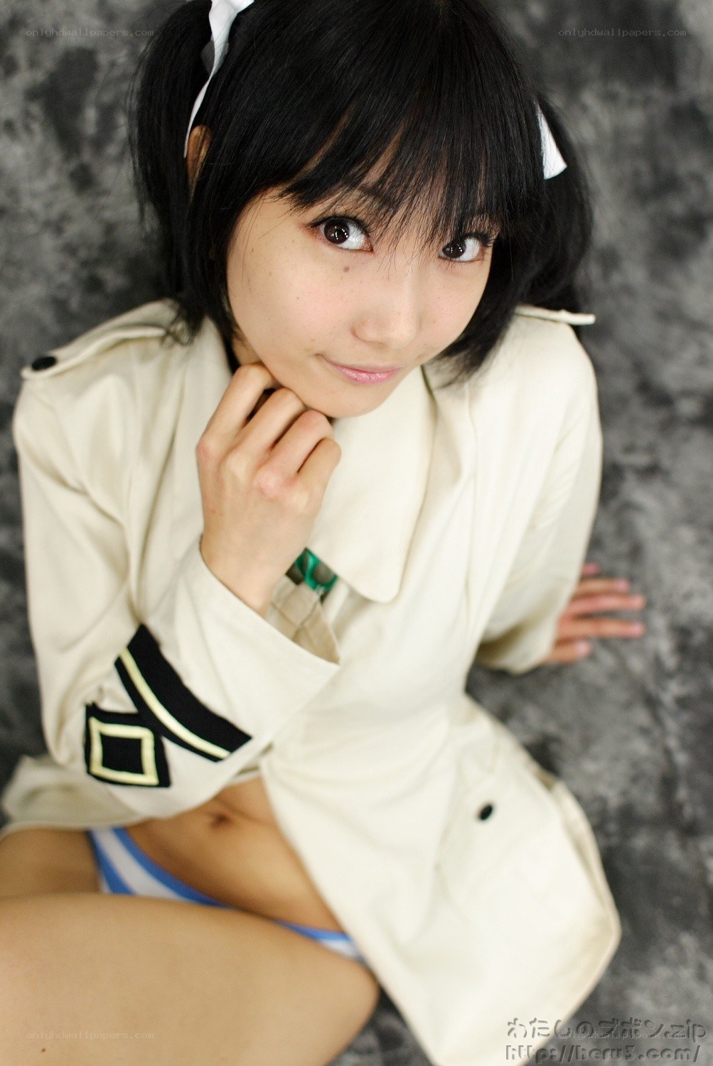 cosplayer in beige coat