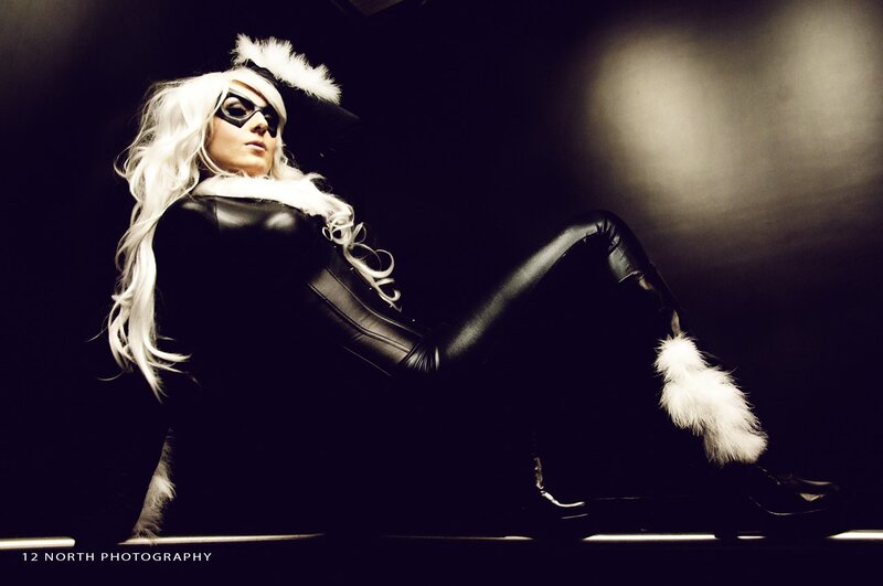 cosplayer in black and white costume