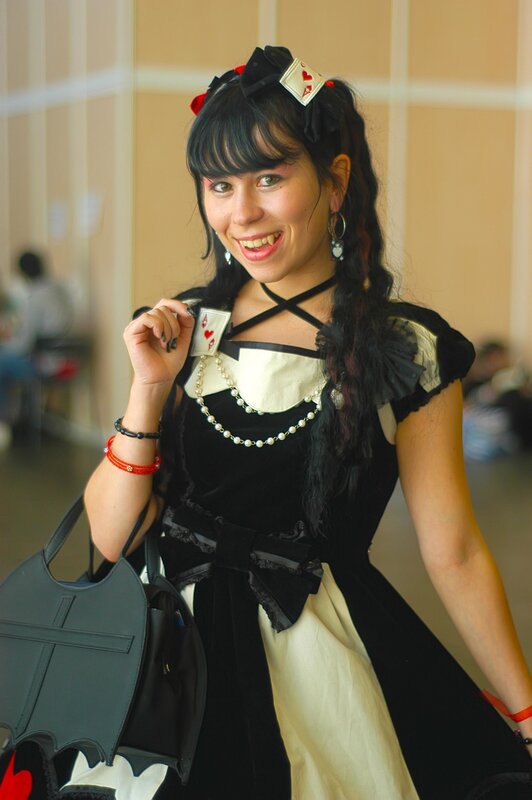 cosplayer in black and white dress
