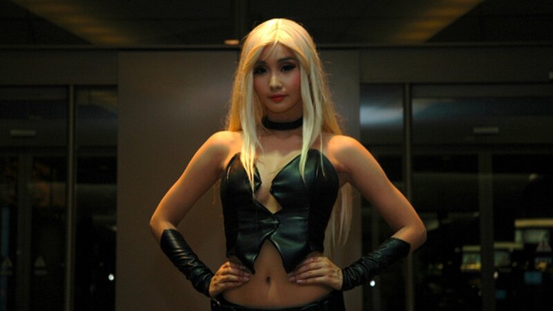 cosplayer in black costume