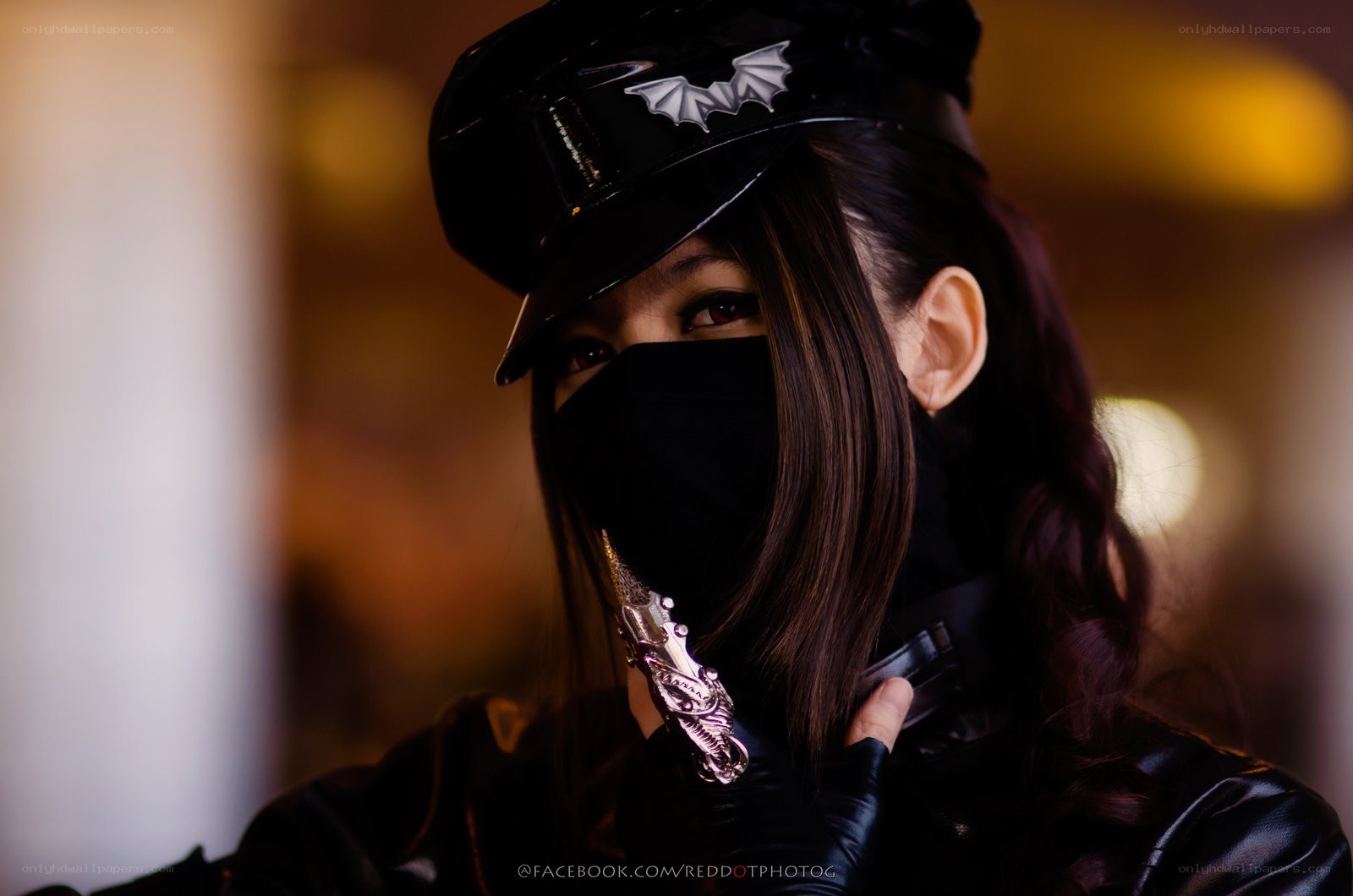cosplayer in black costume