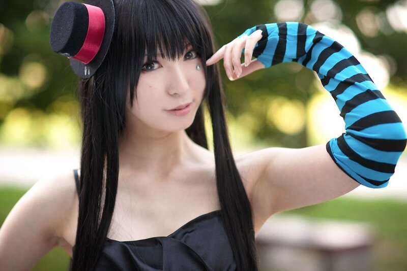 cosplayer in black dress