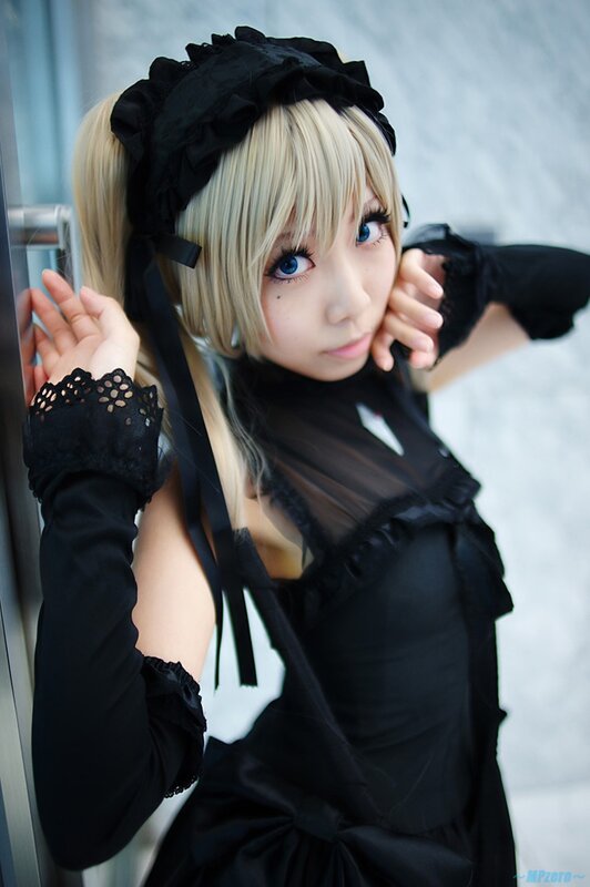 cosplayer in black maid outfit