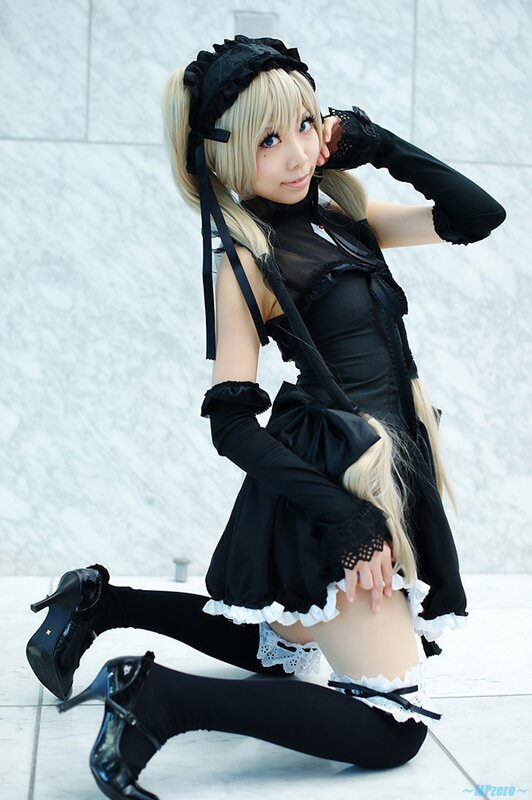 cosplayer in black maid outfit