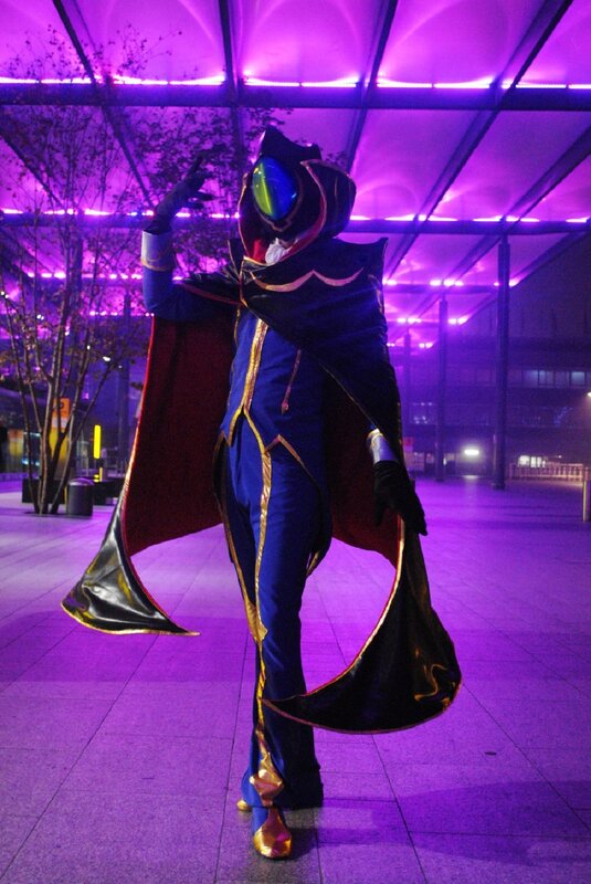 cosplayer in blue and black costume