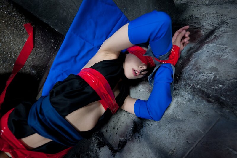 cosplayer in blue and red costume