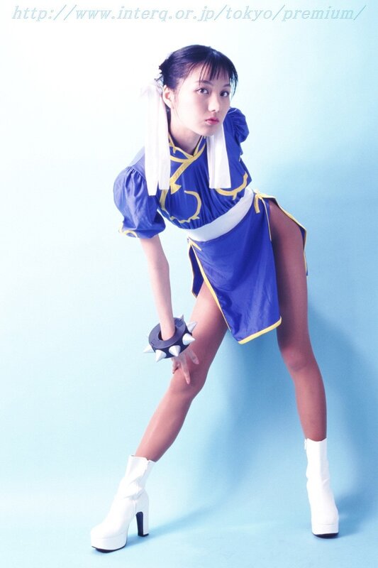cosplayer in blue and white costume